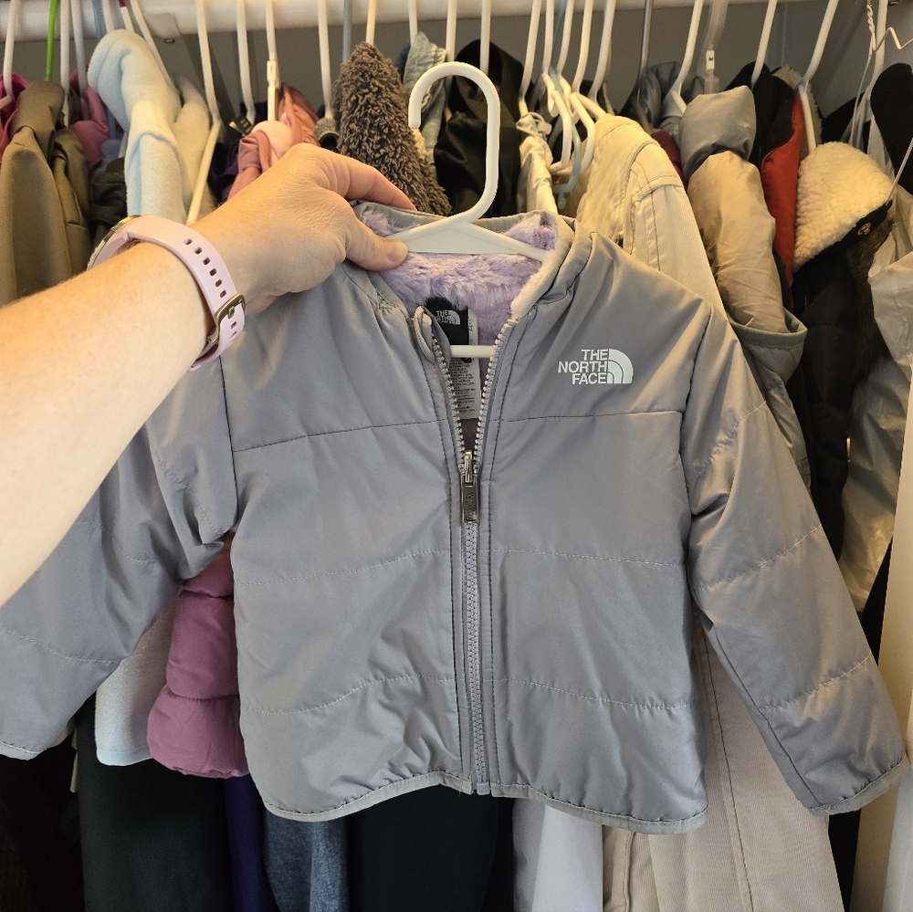 The North Face Kids Light Gray Puffer Jacket with Lilac Lining. Reversible.